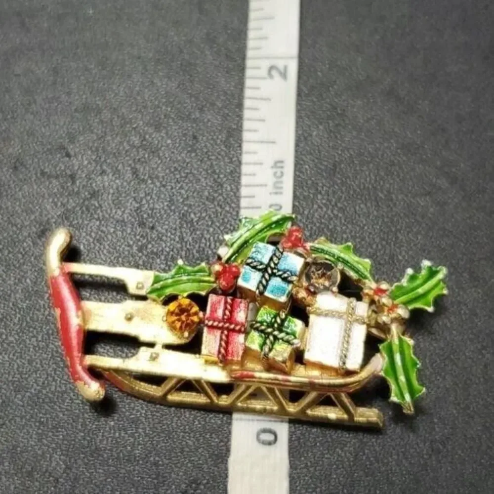 Vintage Weiss holiday sled brooch gold tone red green